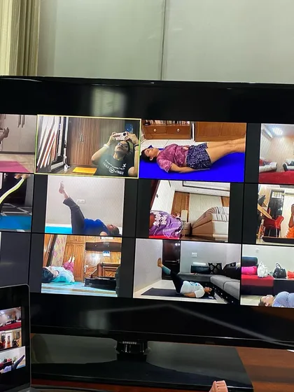 A snapshot from a core-focused session where everyone is doing leg raises. Building a strong core is fundamental to overall fitness, and we do it together with lots of encouragement.