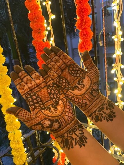 A festive design with peacocks and lotuses, perfect for any celebration.