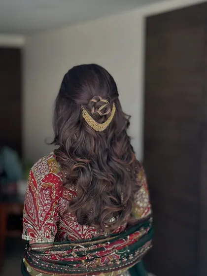 A final look at the creative half-updo, showcasing a unique style for a pre-wedding event.