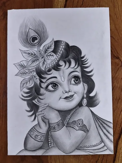 An adorable sketch of Little Krishna, capturing his innocent and divine charm. These drawings are perfect for a child's room or a family prayer space.