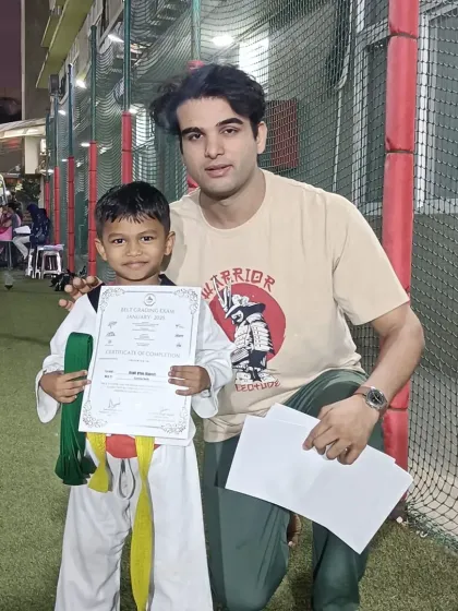 This young warrior has successfully passed his belt exam. His journey is just beginning.