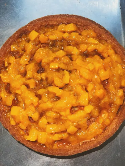 The first step of my mango tart: a rich, flavorful mango compote made from real fruit, with no premixes or shortcuts.