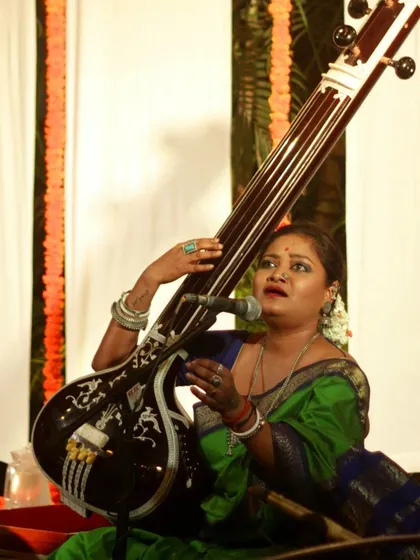 Vocalist Rageshri Das holding her tanpura. She brings an authenticity to her Thumri and Dadra performances that is truly rare and beautiful.