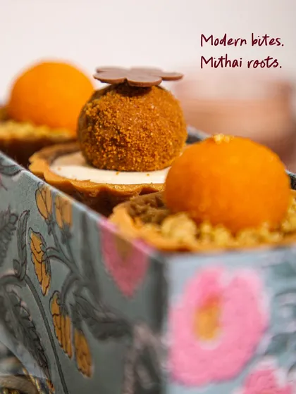 A close-up of our Mithai Tartlets, where modern patisserie finesse meets traditional Indian mithai roots. Each bite is a delightful fusion of familiar and new flavours.