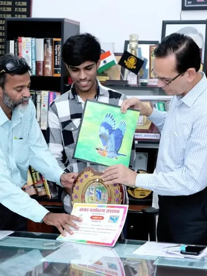 Another photo from the award ceremony with the District Collector. Moments like these motivate me to work even harder.