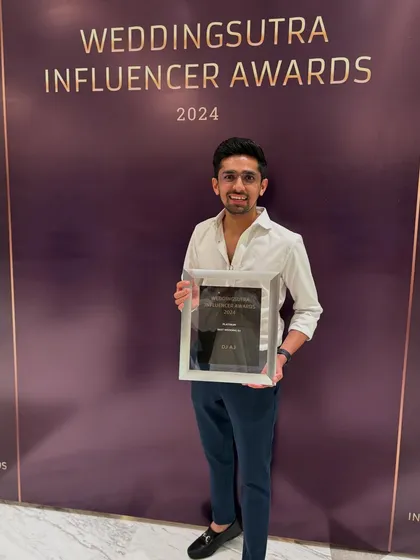 Holding my 2024 WeddingSutra Influencer Award. It's an honor to be recognized for my work year after year.