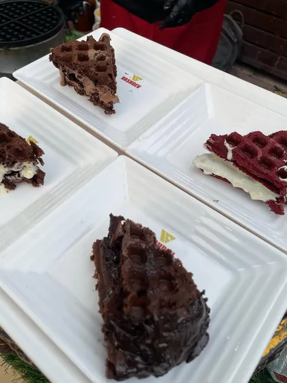 A variety of our waffle offerings, including chocolate, red velvet, and classic flavors. We can create a full waffle bar with multiple choices for your event.
