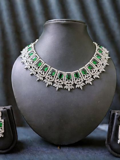 The full set view of this emerald-green AD necklace and earrings, perfect for a chic, modern look.