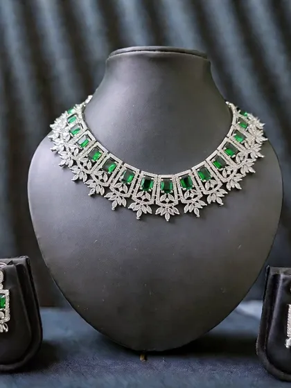 The full set view of this emerald-green AD necklace and earrings, perfect for a chic, modern look.