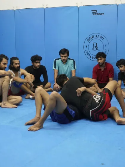 A demonstration of grappling technique. I break down every move so students understand the mechanics of control and submission.