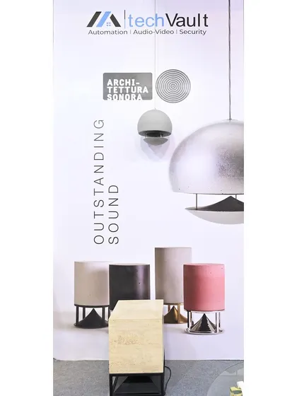 A display at our booth showcasing our partnership with Architettura Sonora, a brand known for its "Outstanding Sound" and artistic speaker designs. We partner with the best in the industry to offer our clients exceptional products.
