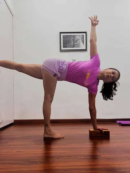 Parivritta Ardha Chandrasana (Revolved Half Moon Pose). Yoga was discovered to save human beings from the ocean of desires. It is a light of knowledge uncovered through persistent practice.