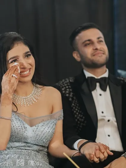 The bride gets emotional watching her family perform. Our goal is to create those heartfelt, goosebump moments.