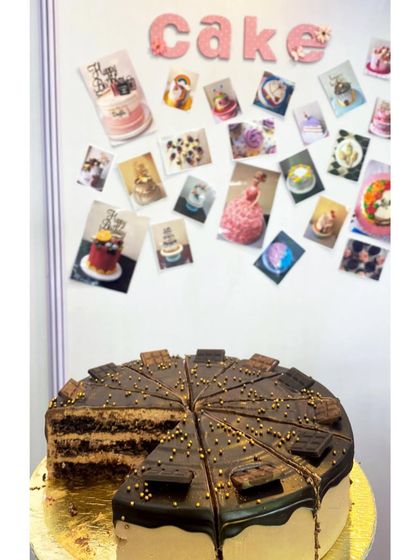 Celebrating my 1000th post with a wall of memories. Each picture represents a special cake and a happy client. I'm so grateful for all the support on this journey.