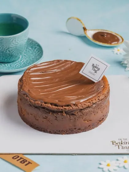 Drown in the decadence of my baked Nutella cheesecake. It's rich, creamy, and has a generous layer of pure Nutella on top. A true dream for any chocolate-hazelnut lover.