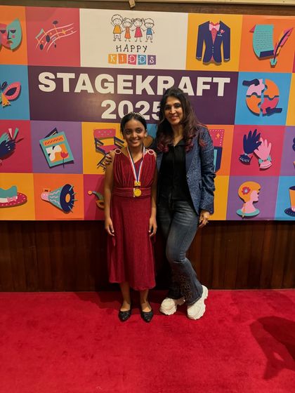 Posing with another one of our stars. Her powerful performance lit up the stage.