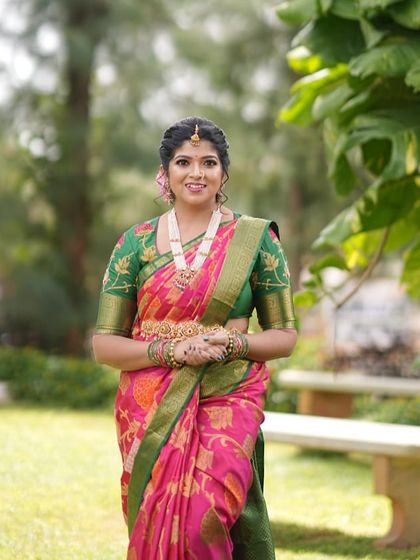 The rich fabric and intricate craftsmanship make this ensemble a true masterpiece, perfect for weddings and festive celebrations.