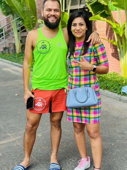 A duplicate of image 101. Posing with a fellow runner and friend.