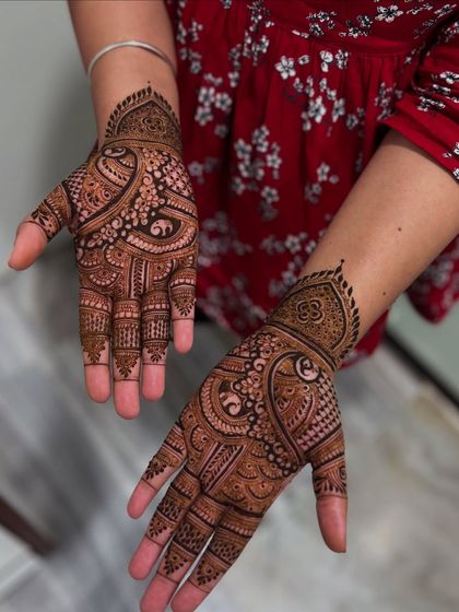 Another view of the Teej festival mehendi, showing the rich color of the henna paste. The combination of thick and thin lines creates a beautiful, dynamic look.