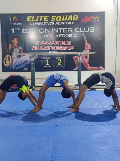 Our boys practicing a three-person back bridge. These recreational movements are great for building strength and flexibility in a collaborative way.
