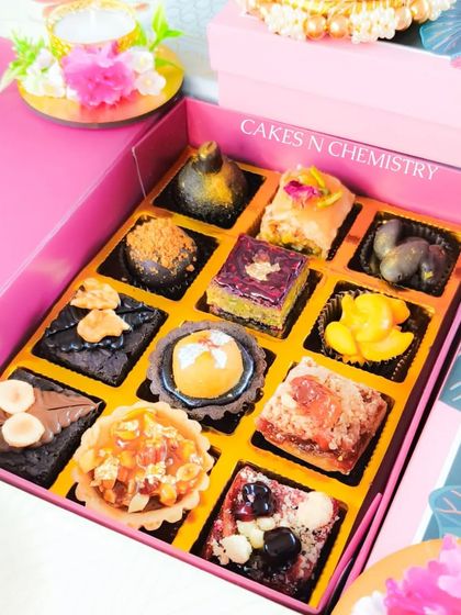 This assorted box of 12 festive confections is a journey of flavors. It includes a variety of my signature brownies, fusion tarts, and Indian-inspired sweets, making it a perfect gift for families and corporate clients during Diwali.