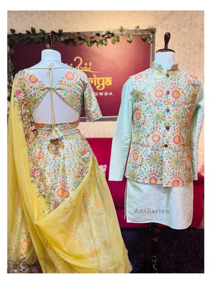 Here is a preview of a coordinated set for couples, available to rent. This matching floral lehenga and Nehru jacket is perfect for daytime events like a Mehendi or an engagement party.