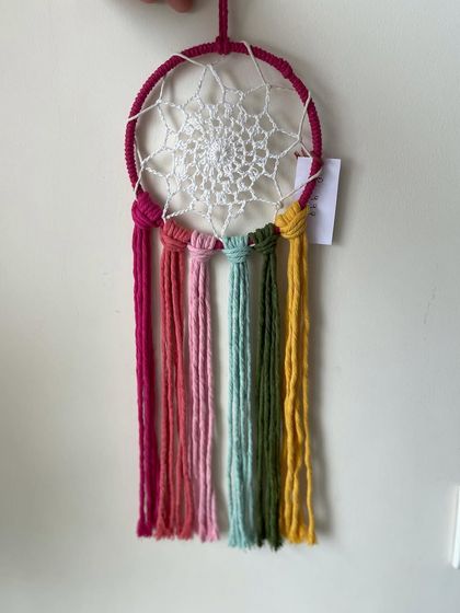 Another design of my unicorn dreamcatcher. The crochet center and colorful tassels make it a really fun and cheerful piece of wall decor.
