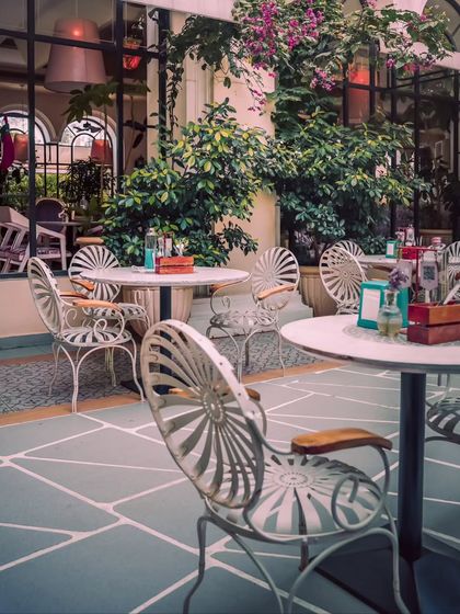 The courtyard at Roxie, where wrought-iron chairs and stone-paved floors evoke the feeling of a European escape, right here in Bangalore.
