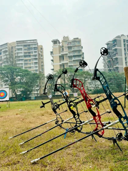 A close-up of our lineup of compound bows, showcasing the professional equipment available for our students.