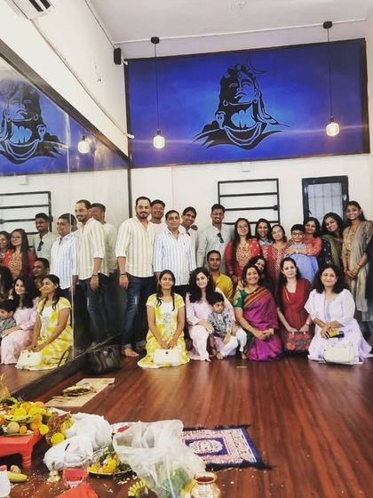Welcome to our new place. A group photo with my wonderful students and their families at the opening puja of our new studio. It's a space filled with good energy.