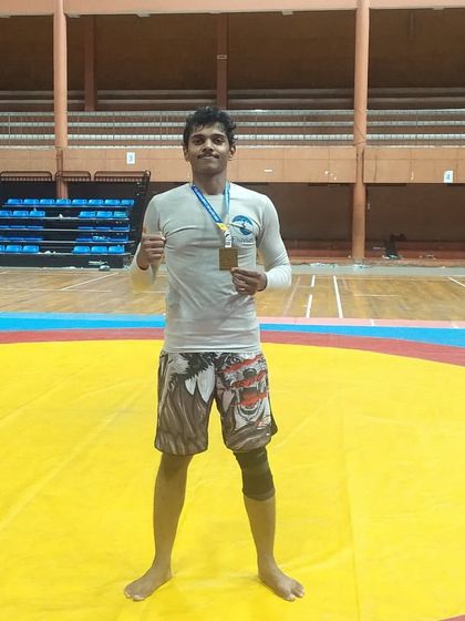 Receiving my gold medal, cash prize, and supplements from the event organizers and sponsors in Kerala. It's great to see the sport growing and getting support.