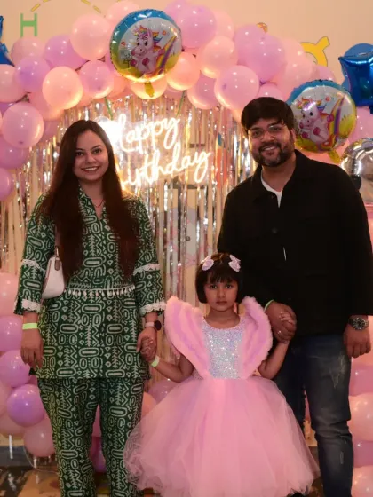 A family photo capturing the love and joy of a birthday celebration.