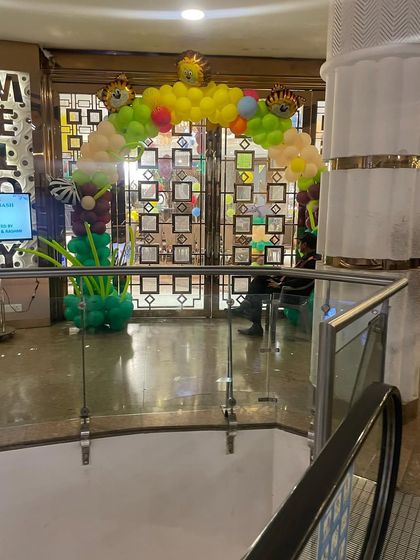 An example of decoration for a corporate or mall event. This balloon arch was created for the entrance of a melody room in a mall, showing that I can handle commercial projects too.