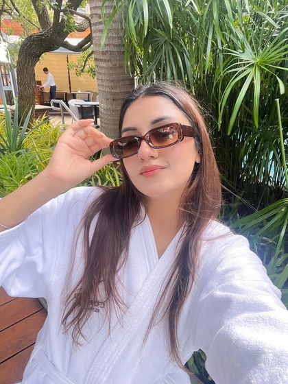 Right before the dip. A selfie in my bathrobe and sunglasses, ready to enjoy a swim.