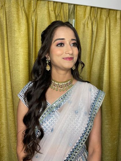 This bride is looking absolutely stunning and happy for her pre-wedding rituals. The look is subtle, beautiful, and lets her radiance shine.