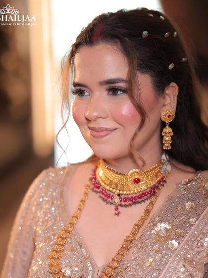 A candid shot of my happy client on her engagement day. The soft, rosy blush and glowing skin give her a beautiful, natural radiance.