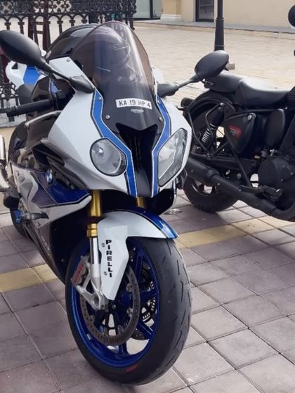 A front view of a BMW S1000RR superbike, showcasing its distinctive design and high-performance look, a common sight at our weekend gatherings.