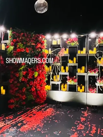 We crafted a dramatic and sophisticated atmosphere for this cocktail night using a bold palette of red and black. The wall of candles and rich red florals created an intimate, high energy photo corner that was a highlight of the evening.