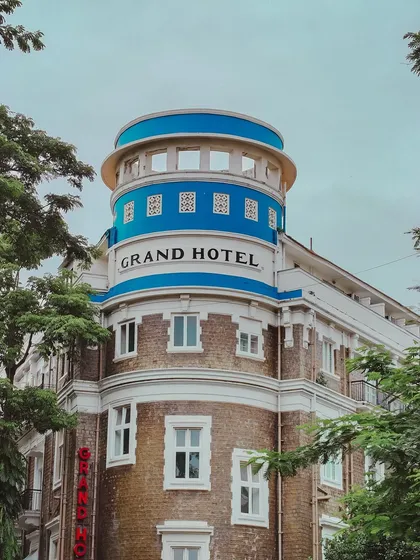 The unique art-deco design of the Grand Hotel in Ballard Estate, a beautiful example of Mumbai's diverse architectural heritage.