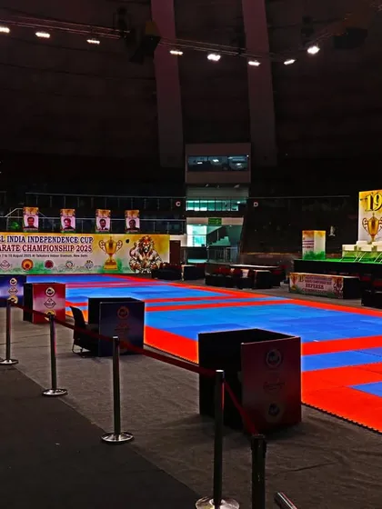 The main stage and competition area at the Talkatora Indoor Stadium, ready for the Independence Cup. We ensure high-quality branding and presentation at all our events.