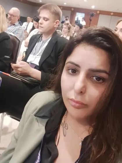 Dr. Ritu at an international aesthetics conference. This dedication to global best practices ensures we bring world-class treatments and knowledge back to our clients in Gurugram.