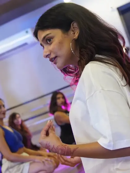 The instructor sharing her knowledge during an intensive class.