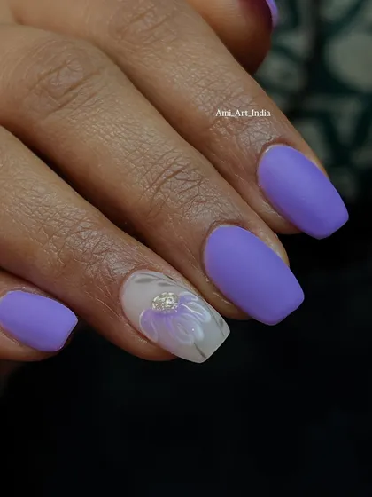 A closer look at the hand-painted flower with a tiny rhinestone center.