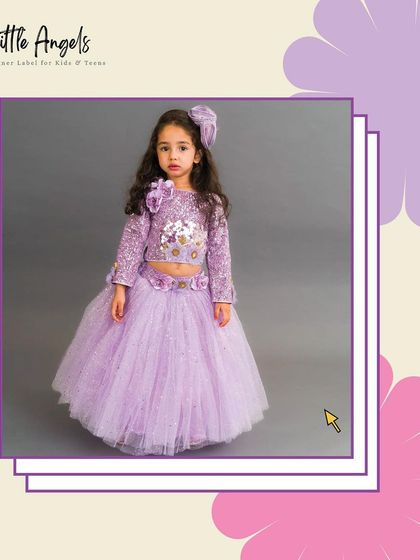 Our shimmer skirt and top set in lilac, featuring floral appliqué on the blouse and a sparkling tulle skirt.