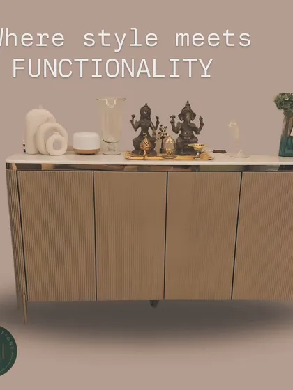 This modern sideboard features a ribbed texture and a clean, neutral finish, topped with white marble. It's a versatile piece that provides ample storage while adding a touch of contemporary elegance to any room.