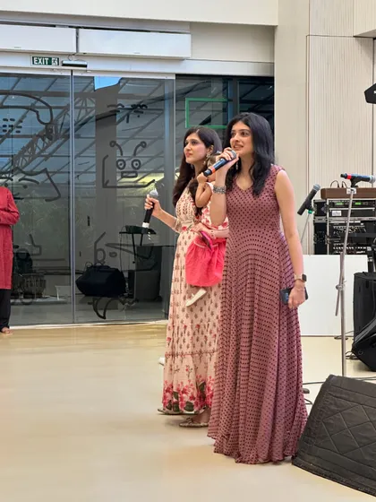 Our co-founders Kamakshi and Vishala lead the performances at our fundraiser, sharing their passion for music with the audience and our students.