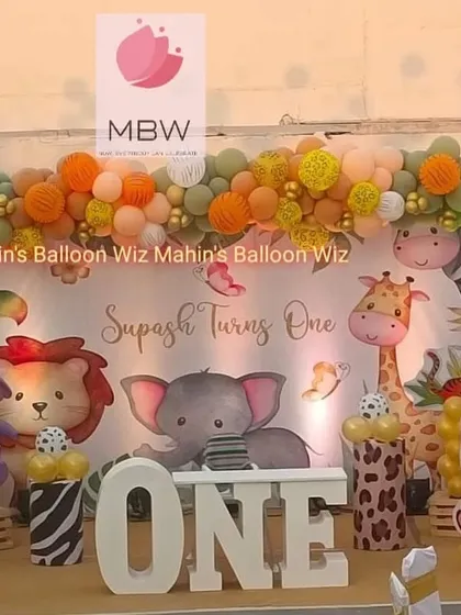 A detailed shot of the jungle party stage, focusing on the adorable elephant, lion, and giraffe characters that make the theme so special.
