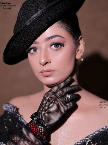 Our courses teach you to create high-fashion, editorial-quality looks. This image showcases the advanced techniques our students master, from flawless skin to dramatic eye makeup, preparing them for any client request.