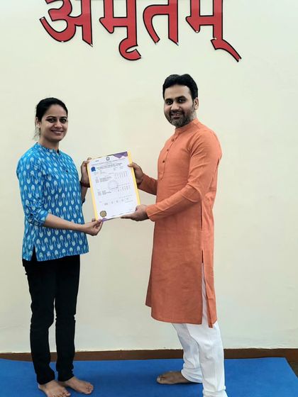 We congratulate this student on receiving her 'Yogacharya' certificate. Her focus and hard work have paid off.