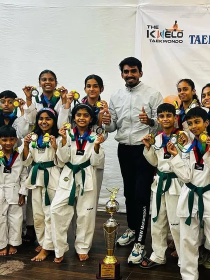 The full team with our trophy and medals. Every student contributed to this success.